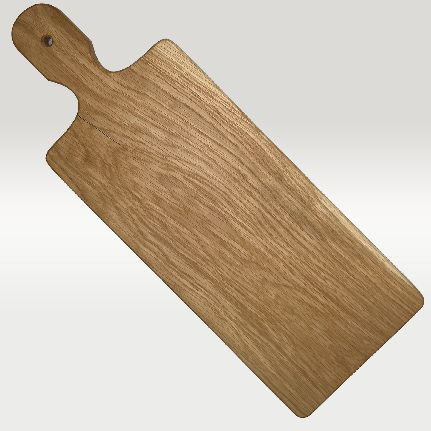 Servierbrett aus Eiche mit Wendlandsonne Intarsie aus Padauk
